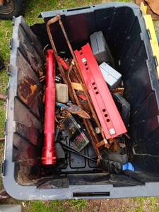 Plastic tote full of tools and hard...