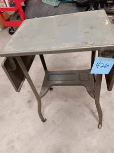 Metal shop table on wheels...