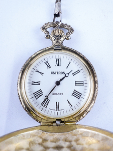 lot 35 image: Unitron Embossed Railway Design White Base Metal Quartz Pocket Watch. New Battery Installed