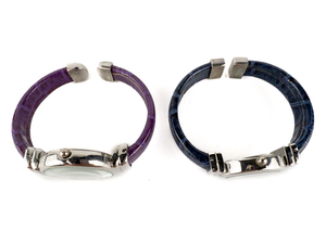 lot 86 image: Ladys Set of two Blue & Purple Faux Leather Open Cuff Band Stainless Steel & Base Metal Quartz Analog watches. Working