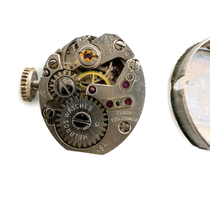 lot 100 image: Ladys Helbros White & Black Stretch Band Stainless Steel & Base Metal Mechanical Watch. Working