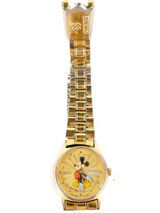 lot 105 image: Ladys Seiko Walt Disney Micky Mouse Water Yellow Base Metal Quartz Analog watch. Working