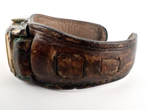 lot 137 image: Kelton 17 Jewel #88366 Leather Band Open Cuff #2180275 Yellow Base Metal Mechanical Watch. Not Working