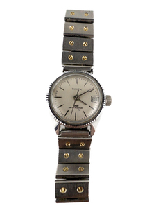 lot 143 image: Ladys Timex Date With Silver Tone Dial White Stainless Steel & Base Metal Mechanical Watch. Starts When Wound