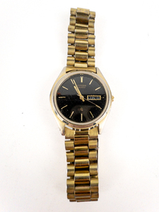 lot 145 image: Mens Citizen Day Date 6100-S18591 With Black Dial Yellow Stainless Steel & Base Metal Quartz Analog watch. Working