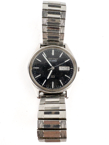 lot 148 image: Mens Seiko Day Date 5Y23.8049 With Black Dial White Stainless Steel Quartz Analog watch. Not Working