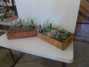 lot 26 image: Vintage Coke Case Bottles x 2