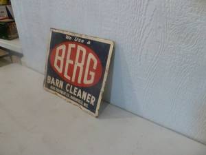 lot 32 image: Vintage Berg Tin Sign