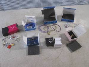lot 322 image: (EC1) Assorted Avon Jewelry Including 125 Year Charm Bracelet