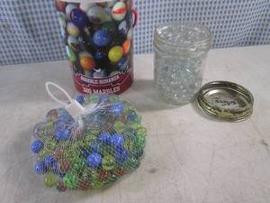lot 312 image: (BS) Bag of Marbles and Mason Jar Full of Clear Marbles (Note Includes a Bag Full of More Clear Marbles Not Pictured)