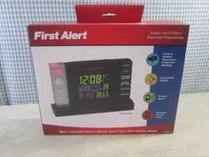 lot 284 image: (BS) First Alert IndoorOutdoor Radio Controlled Weather Station Alarm Clock with Wireless Sensor - New