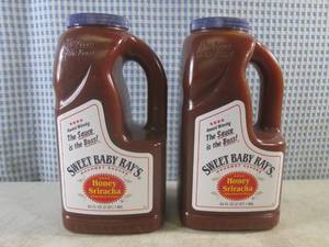 lot 384 image: (B-2) 2 - Half Gallon Sweet Baby Rays Honey Sriracha Wing Sauce & Glaze 64oz (2 QT) Best by Jan 2024