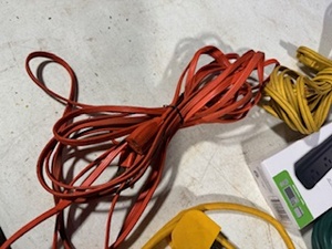 lot 52 image: Four Extension Cords and Two Surge Protectors