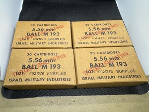 lot 69 image: 5.56 MM Cartridges.  Four Boxes. Thirty Cartridges per Box