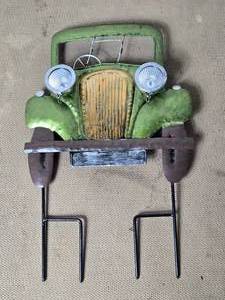 lot 29 image: Vintage Car Yard Ornament - Solar Light Up Head Lights