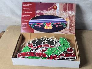 lot 35 image: 60 Holographic Bells and Holly