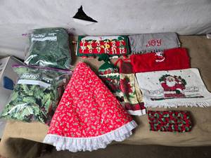 lot 37 image: Christmas Items Lighted Garland, Leaves, Tree Skirt, Countdown Calendar, Towels