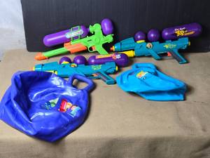 lot 94 image: Super Soakers and Bouncy Balls