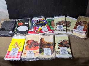 lot 106 image: About 40 PaperPlastic Table Cloths - Round and Rectangle