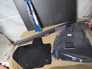 lot 110 image: Ford Pickup Floor Mats, Subaru Floor Mats, Retractable Cargo Shade, Wiper Blades