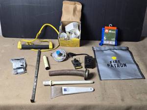 lot 140 image: Motion Light, Rain Gear, Water Ski and More