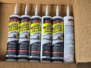 lot 16B image: 6 Tubes of Blacktop Crack Filler
