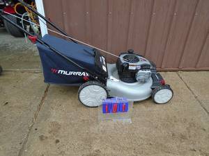 Murray push mower with bagger. Looks nearly new. Tested & works. As shown.