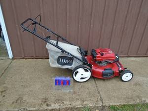Toro Recycler self propelled mower with bagger. Good used condition. Tested & works.