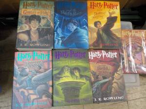 lot 11 image: 7 Harry Potter Hard Cover books...