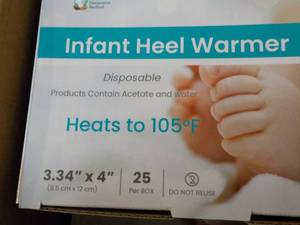 lot 96 image: 4 x 25 each Infant Heel Warmers- can be used for all ages