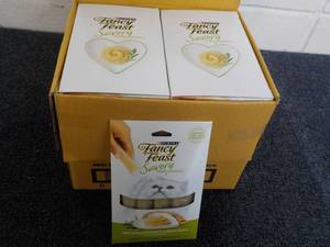 lot 120 image: 30 x 4 packs Purina Fancy Feast Savory Cat Treats with Natural Chicken in a Demi Glaze retail $3 each