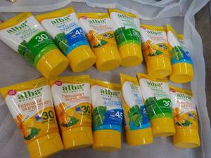 lot 194 image: 12 x 4 oz Alba Sunscreen...