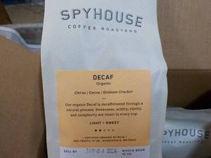 lot 243 image: 6 x 10 oz pkgs Spy House Decaf Whole Bean Coffee Best by 01012024