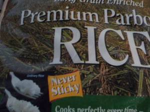 lot 305 image: 50 lb. Bag Premium Parboiled Rice...