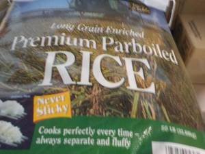 lot 306 image: 50 lb. Bag Premium Parboiled Rice...