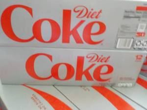 lot 318 image: 2 x 12 packs Diet Coke - best date Mar 11 2024