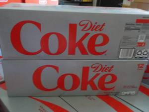 lot 322 image: 2 x 12 packs Diet Coke - best date Mar 11 2024