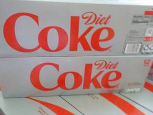 lot 325 image: 2 x 12 packs Diet Coke - best date Mar 11 2024