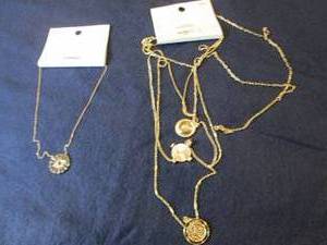 2 Necklaces( one needs untangling)...