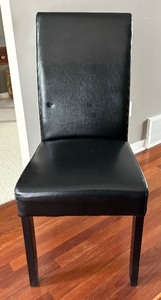 lot 83 image: Sleek Black Faux Leather Accent Chair