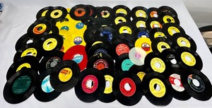 lot 206 image: Large Variety of Vintage Childrens Size 45 Records