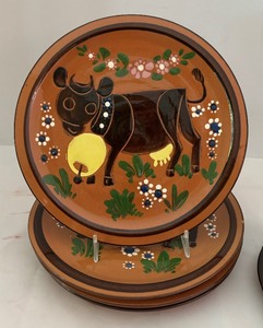 lot 180 image: Swiss Pottery Cow Motif Plates, Cups and Saucers