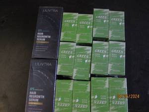 lot of hair growth serum and green mask sticks