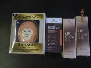 lot of lip glow , eyebrow stamp kit and a bath bomb