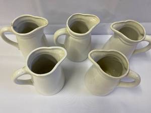 lot 167 image: Five Ceramic Pitchers