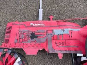 lot 238 image: McCormick Farmall Advertising Piece with Windmill Wheels