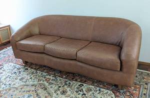 lot 3 image: Brown Faux Leather Sofa
