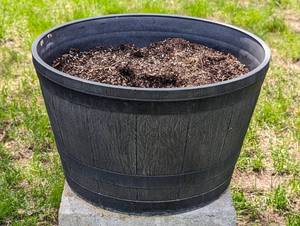 lot 28 image: Three Large Barrel Style Plastic Planters