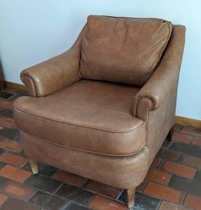 lot 4 image: Brown Faux Leather Armchair