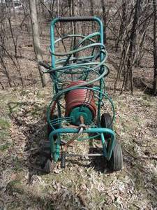 lot 54 image: Watering Hose Cart with Hoses